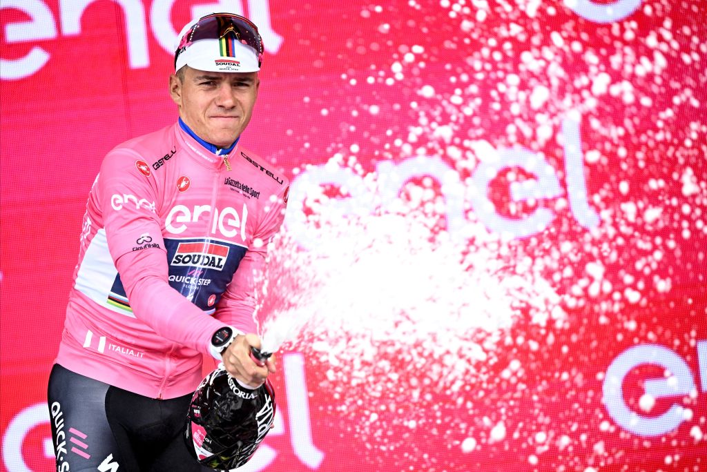 Belgian Remco Evenepoel of Soudal QuickStep celebrates on the podium wearing the pink jersey maglia rosa of leader in the overall ranking during the third stage of the 2023 Giro DItalia cycling race 216km from Vasto to Melfi in Italy Monday 08 May 2023 The 2023 Giro takes place from 06 to 28 May 2023BELGA PHOTO JASPER JACOBS Photo by JASPER JACOBS BELGA MAG Belga via AFP Photo by JASPER JACOBSBELGA MAGAFP via Getty Images