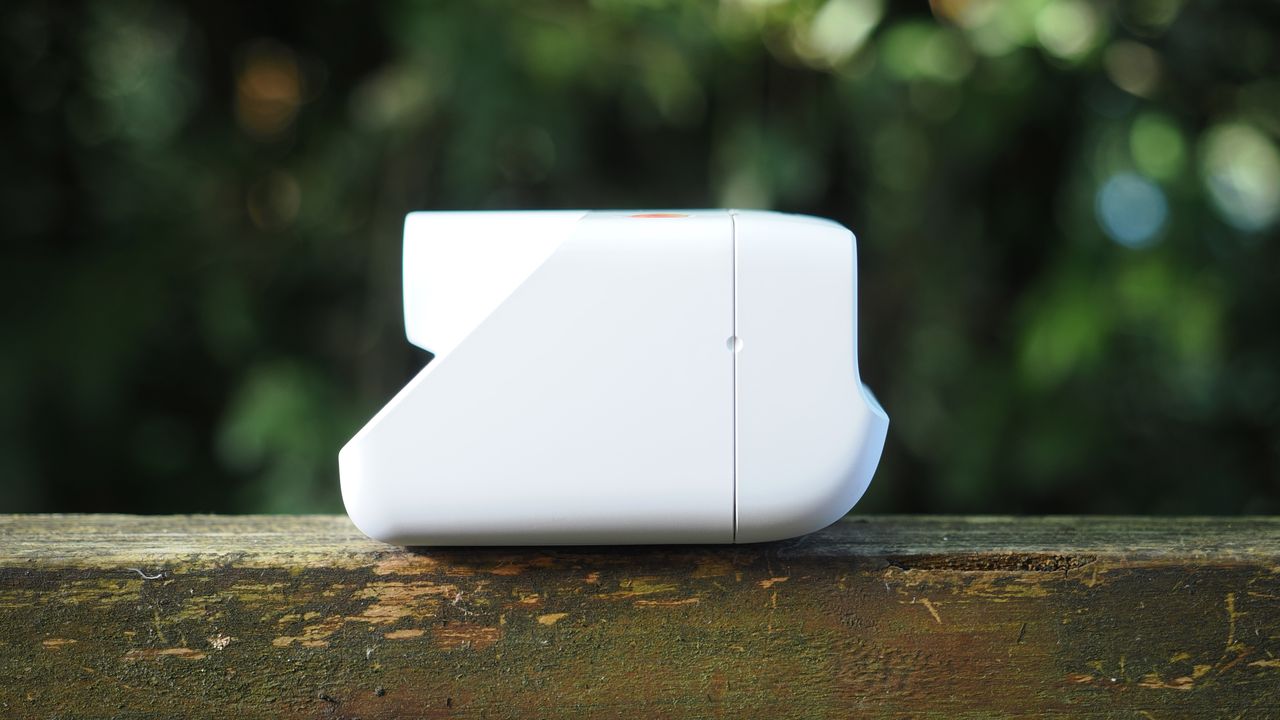 Polaroid Go Gen 3 on a wooden surface outdoors