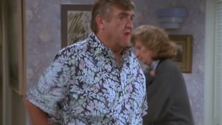 Barney Martin as Morty Seinfeld, wearing an aloha shirt