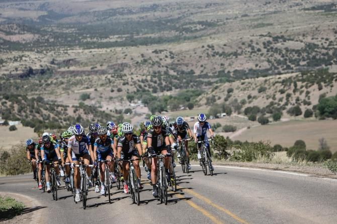 DNA Cycles comes to the front near the base of the final climb