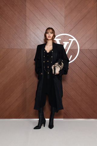 Lisa at the Louis Vuitton F/W 25 runway show.