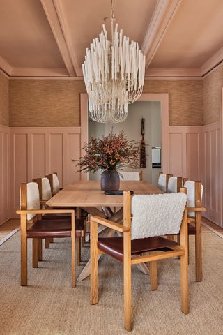 A dining room wall and ceiling painted in Setting Plaster pink