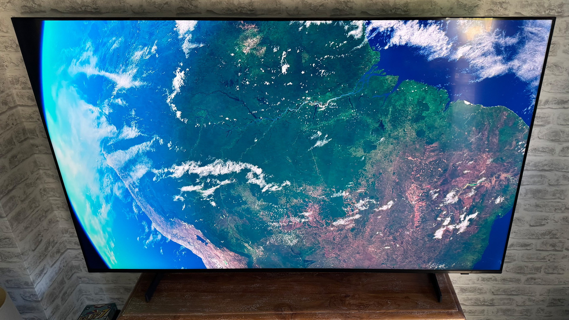 Samsung UE65U8000F 65-inch TV, on screen is view of earth from space