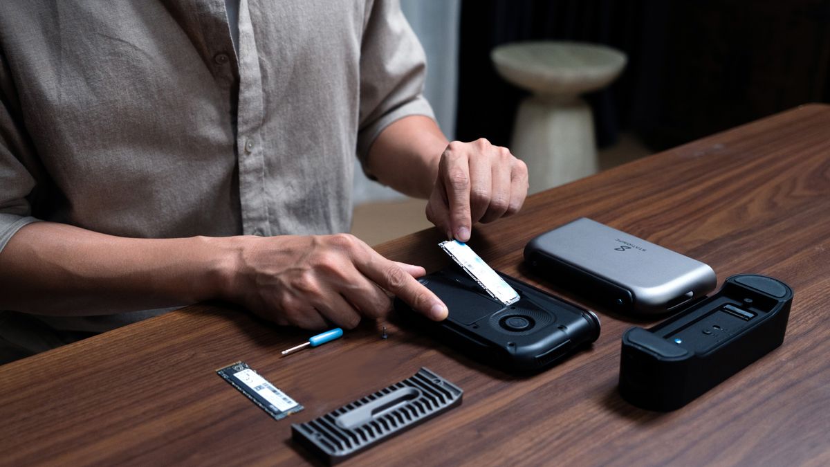 A lifestyle image of the PocketCloud with an internal SSD being added