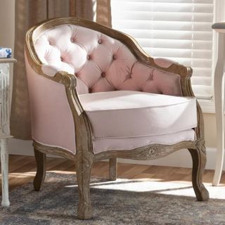 A pink Regency-style upholstered armchair from Wayfair