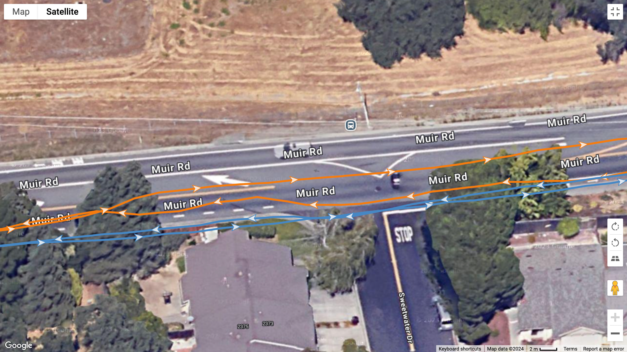 A GPS map showing how the Garmin Forerunner 965 (blue line) compares to the Pixel Watch 3 (orange line) for GPS accuracy. Garmin does significantly better, while Google strays off the track.