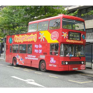 sight seeing bus in manchester in red colour