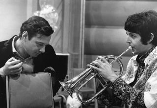 Brian Epstein and Paul McCartney during a break from recording. One of the last pictures of Brian with The Beatles.