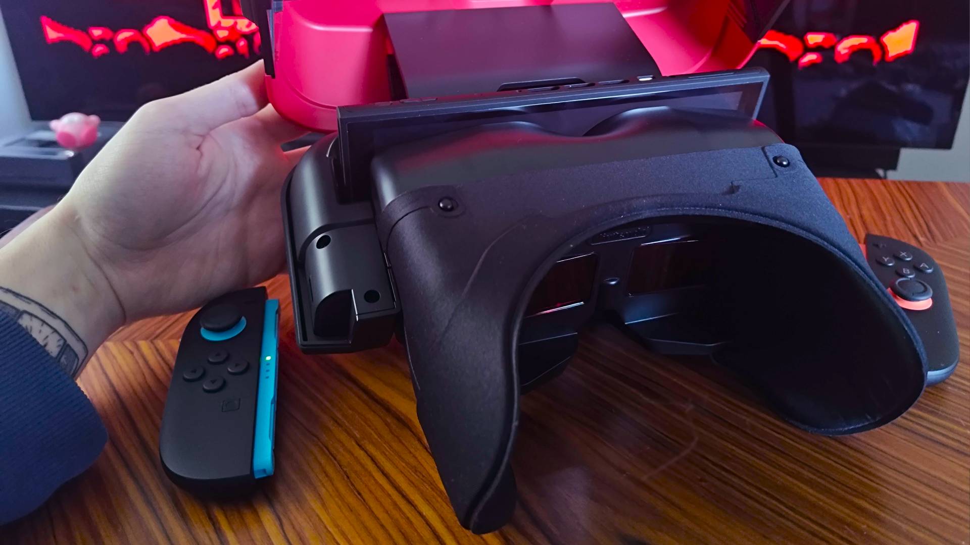 Switch 2 inserted into into Virtual Boy with lid open.