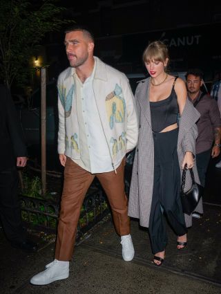 NEW YORK, NY - OCTOBER 15: Travis Kelce and Taylor Swift are seen leaving the SNL after party on October 15, 2023 in New York, New York.
