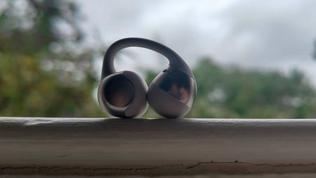 The Shokz OpenDots One on a white windowsill