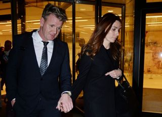 Chef Gordon Ramsay leaves the High Court in London with his wife Tana as he told a High Court judge that he reacted with