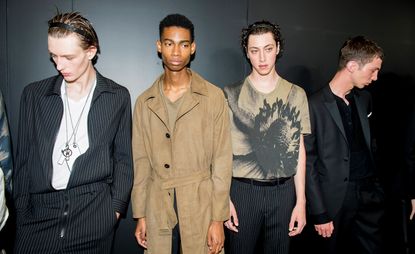 Neil Barrett S/S 2019 - One model wears a tie-dye camel t-shirt