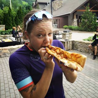 Anne-Marije Rook eats the biggest slice of pizza she's ever had after a few days in the saddle