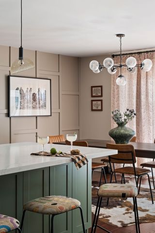 a beige and green kitchen diner