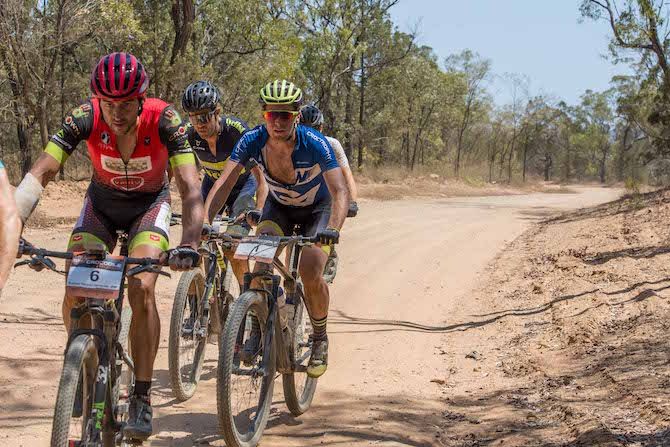Stage 6 winner Bart Classens of the Netherlands (in blue) follows Spain's Brandan Marquez Fernandez at the 2019 Crocodile Trophy