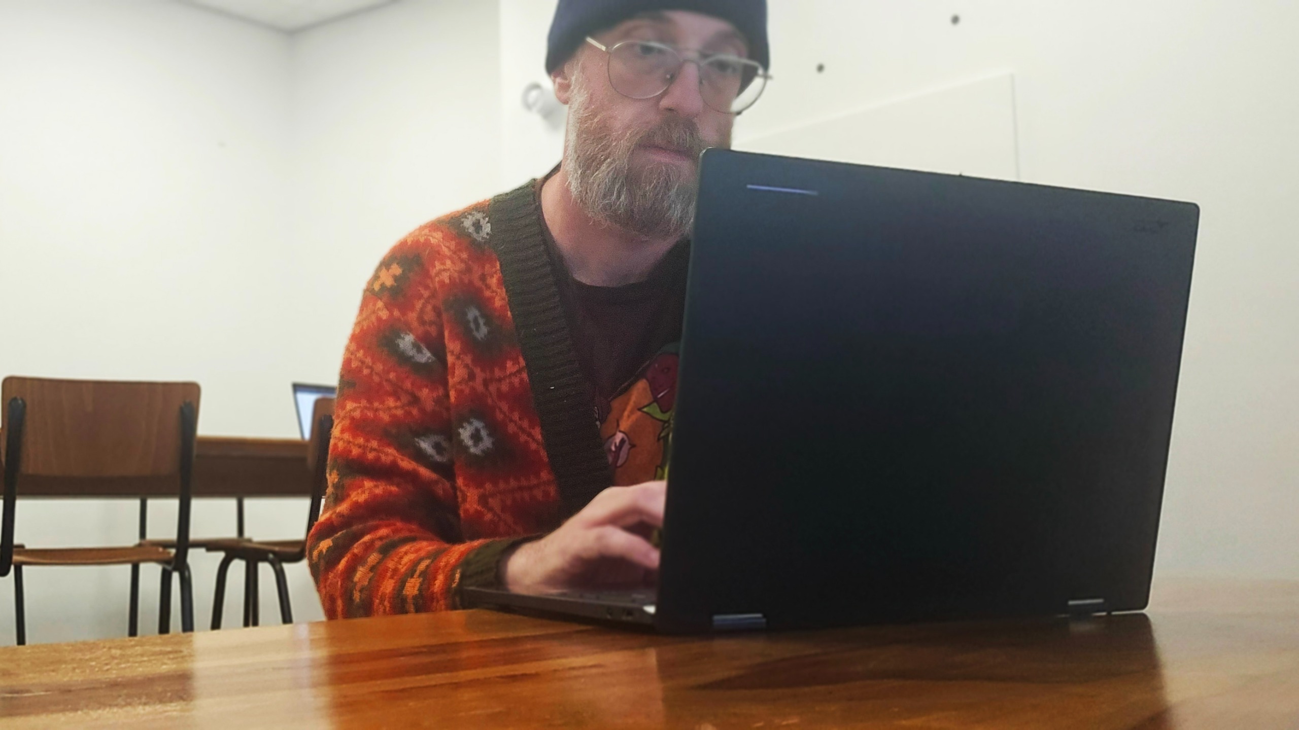 Acer Googlebook 14 on a wooden desk in an office