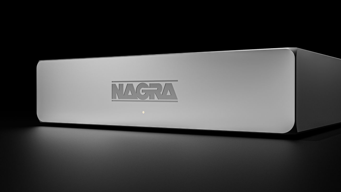 A silver Nagra Compact Player moodily shot on a black background.