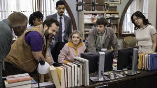 The characters around a computer screen in The Paper