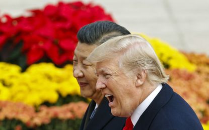 BEIJING, CHINA - NOVEMBER 9:U.S. President Donald Trump takes part in a welcoming ceremony with China's President Xi Jinping on November 9, 2017 in Beijing, China. Trump is on a 10-day trip t