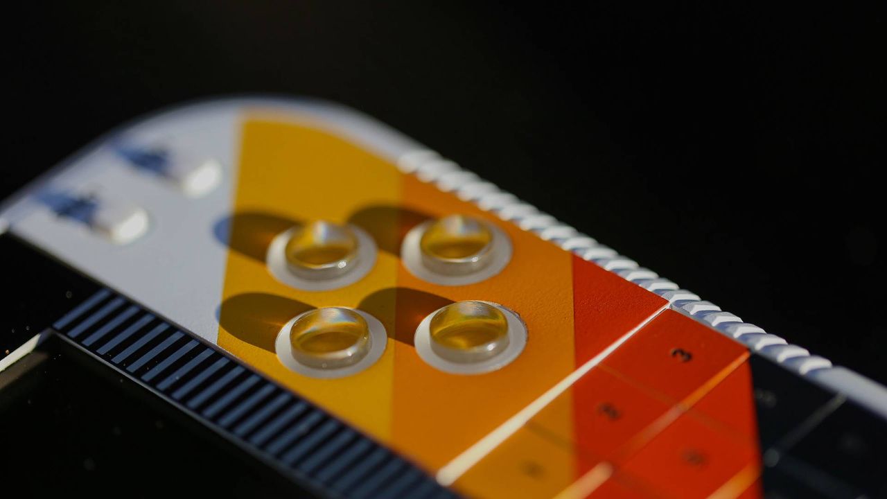 Close up of Atari GameStation Go face buttons and number pad.