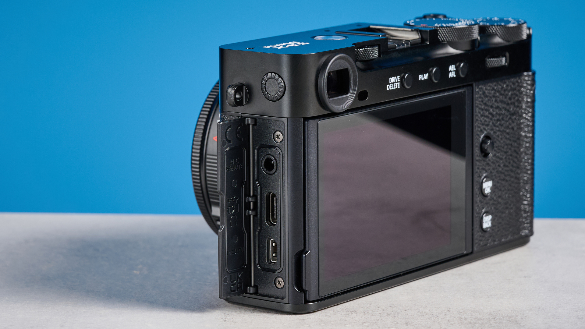Fujifilm X-E5 against a blue background