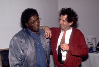 Buddy Guy backstage with Keith Richards.