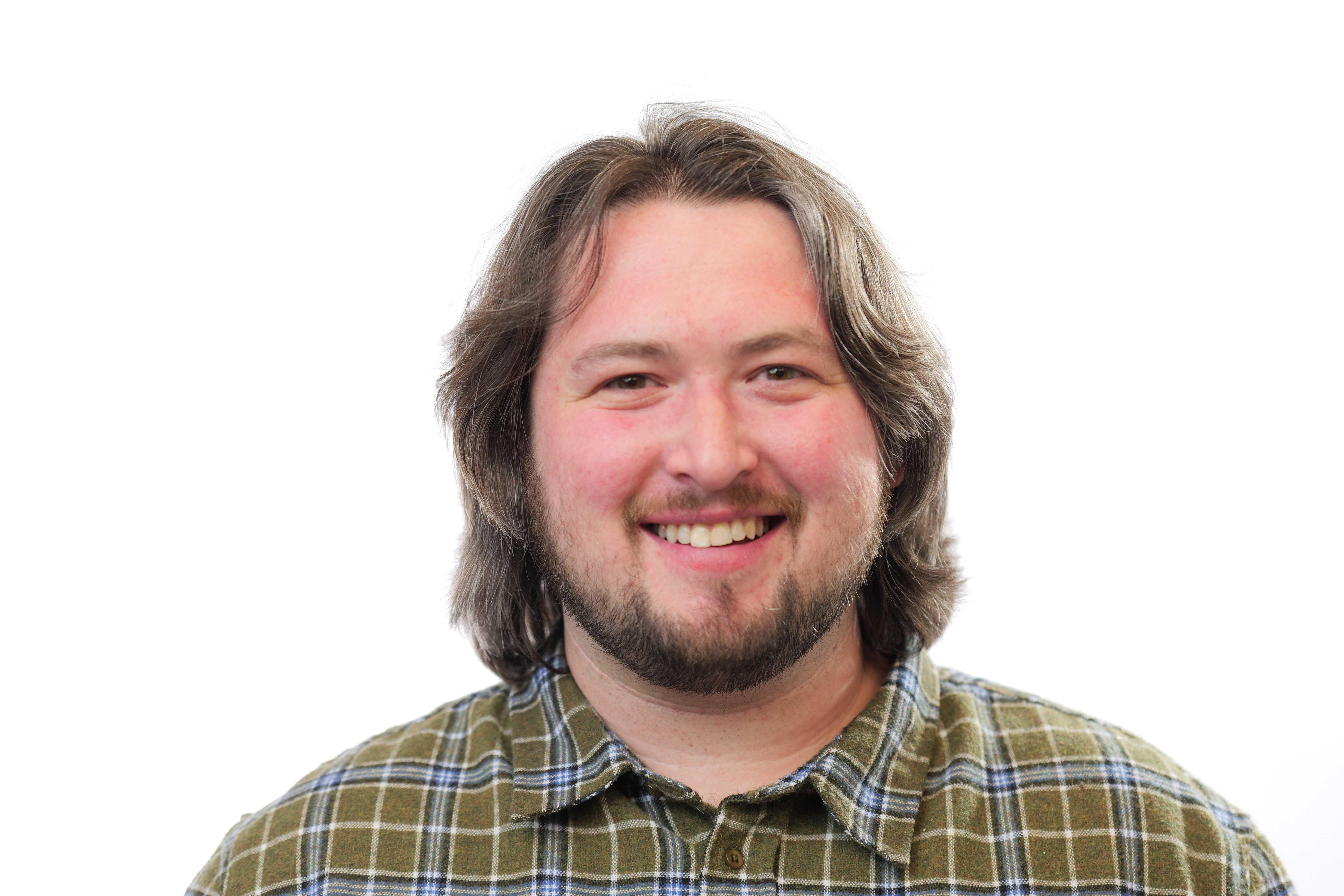 Smiling headshot of Brian Gross.