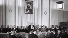  David Ben Gurion, who was to become Israel's first Prime Minister, reads the Declaration of Independence May 14, 1948 at the museum in Tel Aviv, during the ceremony founding the State of Israel