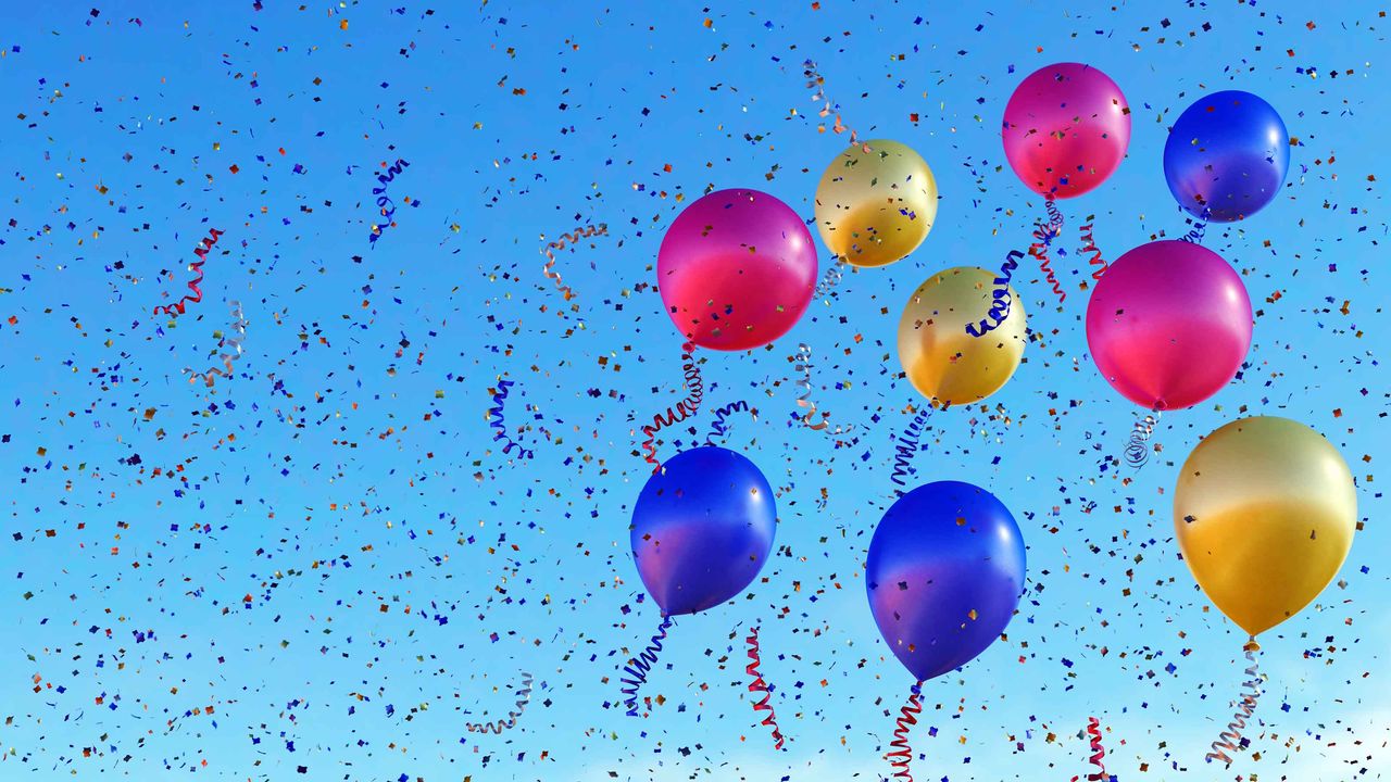 Balloons and confetti in the sky