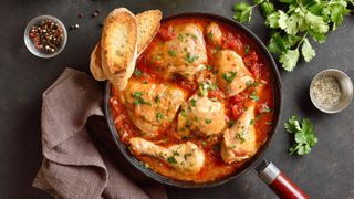 Tomato chicken cooked in cast iron