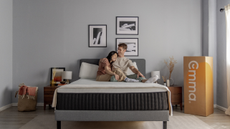 Couple lying down on mattress with emma sleep box