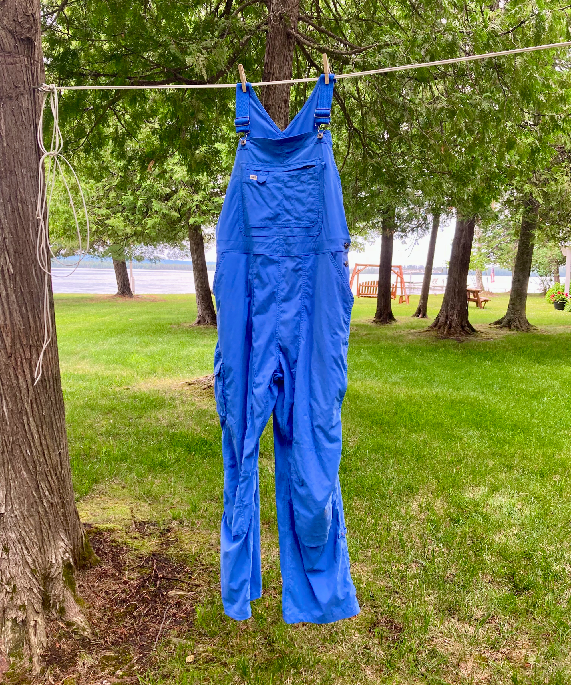 Duluth Trading Co. Heirloom Gardening bib overalls hanging on clothes line