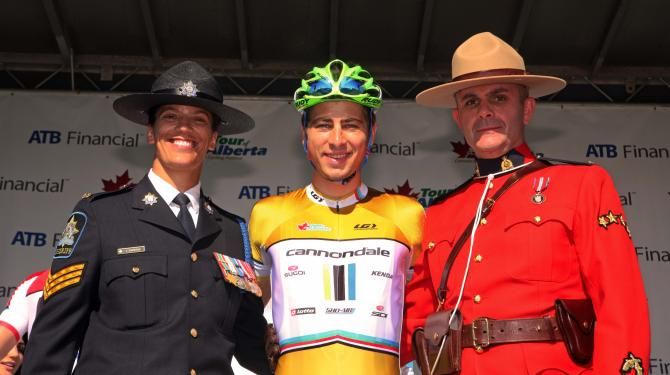 Peter Sagan (Cannondale) with two Royal Canadian Mounted Police