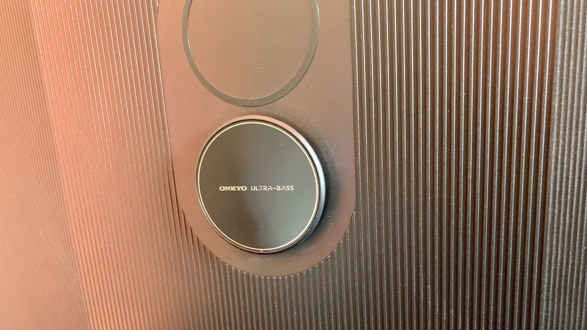 The back of TCL's C84 Mini LED TV, showing the built-in Onkyo subwoofer