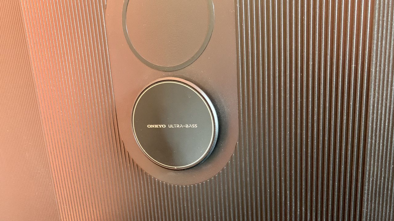 The back of TCL's C84 Mini LED TV, showing the built-in Onkyo subwoofer