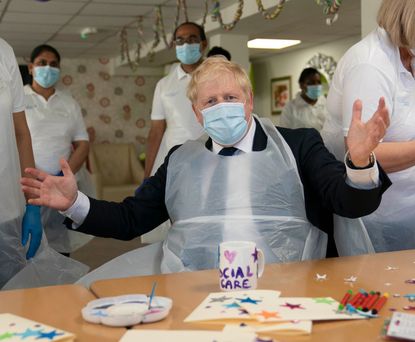 Boris Johnson during visit to Westport Care Home in Stepney Green, east London