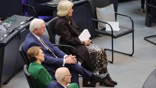 Queen Camilla sitting as King Charles III addresses members of the German Bundestag