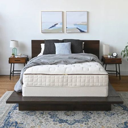 A minimalist bedroom with a Naturepedic mattress.