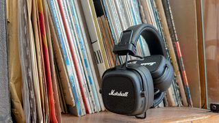 Marshall Major V headphones with some vinyl albums