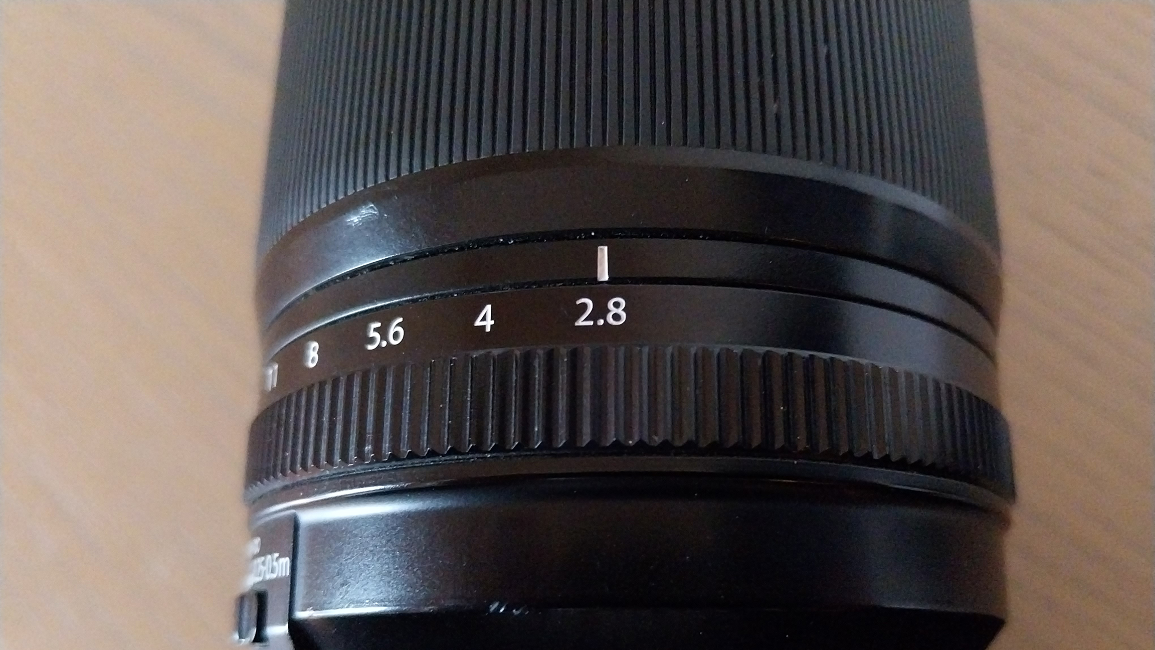 A camera lens with a selected aperture of 2.8