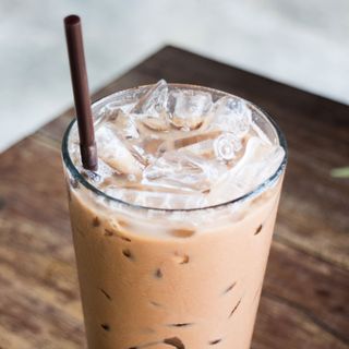 ice coffee with straw and ice cubes