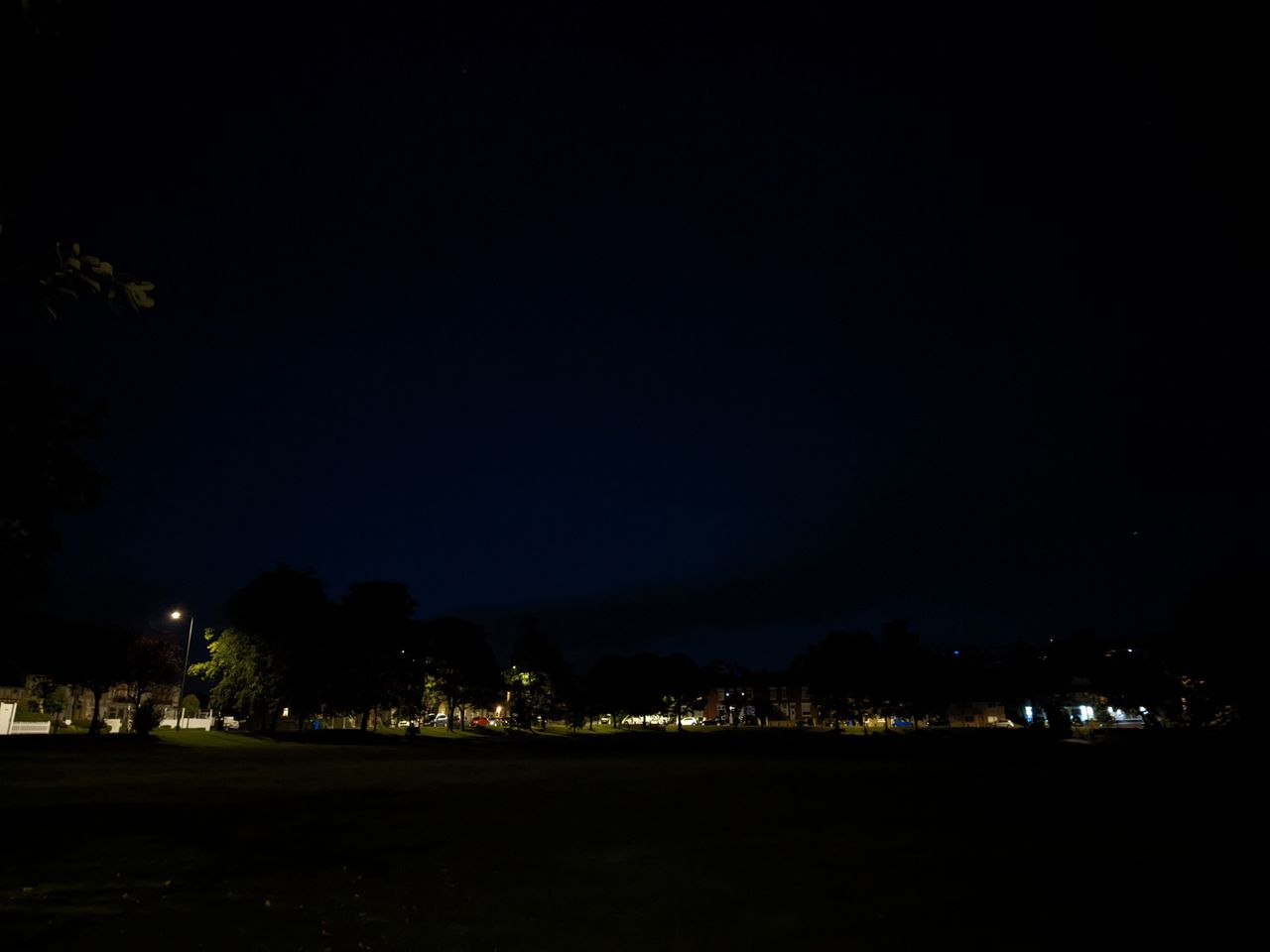 Sony Xperia 10 IV camera sample showing an open green space in the dark with night mode on