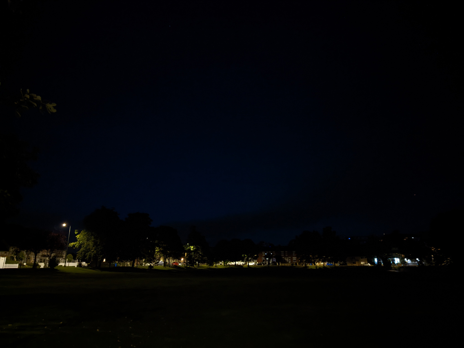 Sony Xperia 10 IV camera sample showing an open green space in the dark with night mode on