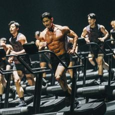 a group of contestants on physical 100 season 2 run on manual treadmills