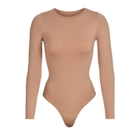 Skims Essential Crew Neck Long Sleeve Bodysuit:was 78now £38 at Skims (save £40)