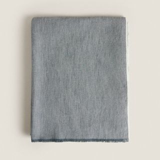 A folded gray cotton and linen blended blanket for Zara Home's summer sale.
