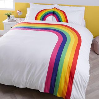 bedroom with rainbow bedding