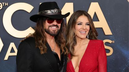 Billy Ray Cyrus and Elizabeth Hurley attend the 59th Annual CMA Awards at Music City Center on November 19, 2025