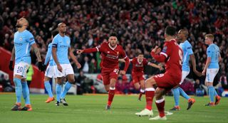 Liverpool’s Alex Oxlade-Chamberlain celebrates scoring against Manchester City in a Champions League quarter-final